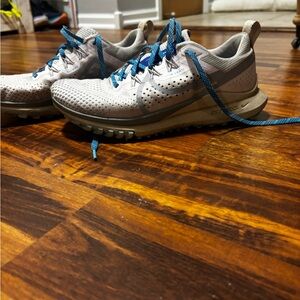 Nike Women's Light Gray Athletic Shoes with Blue Laces